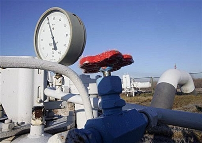 A gas pressure-gauge and the valve of a main gas-pipe, pictured ...