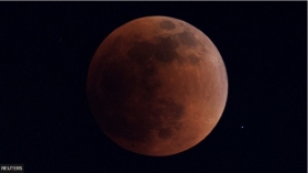 Full lunar eclipse creates rare super blood Moon